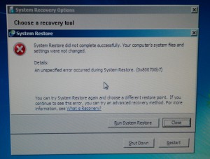 An unspecified error occurred during System Restore. (0x800700b7)